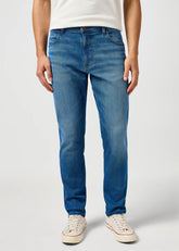 Męskie Spodnie Jeansowe Wrangler River Mosaic 112362543