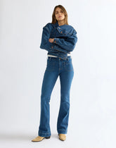 SPODNIE DAMSKIE WRANGLER FLARE BRIGHT MID 112386564