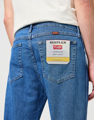 MĘSKIE SPODNIE JEANSOWE WRANGLER RUSTLER SLIM INDIGO MID W10ERC81D 112342563