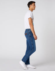 MĘSKIE SPODNIE JEANSOWE WRANGLER TEXAS SLIM GAME ON W12ST112E 112126517