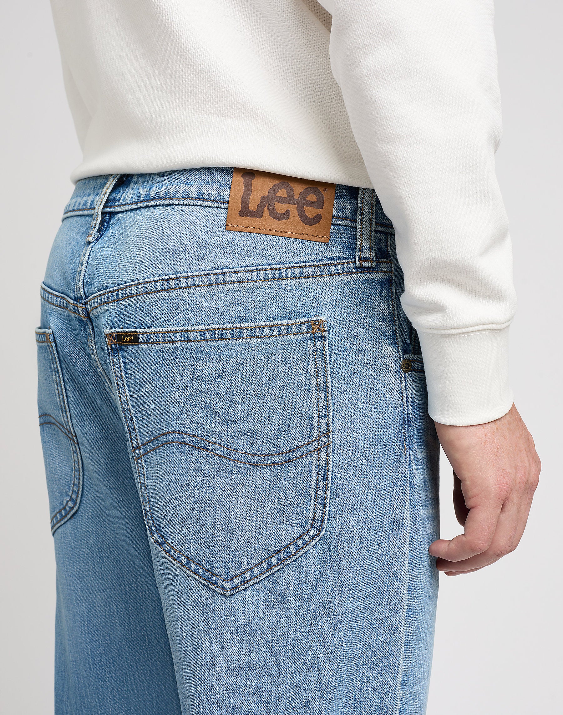 Męskie Spodnie Jeansowe Lee Daren Zip Fly Solid Blues 112350160