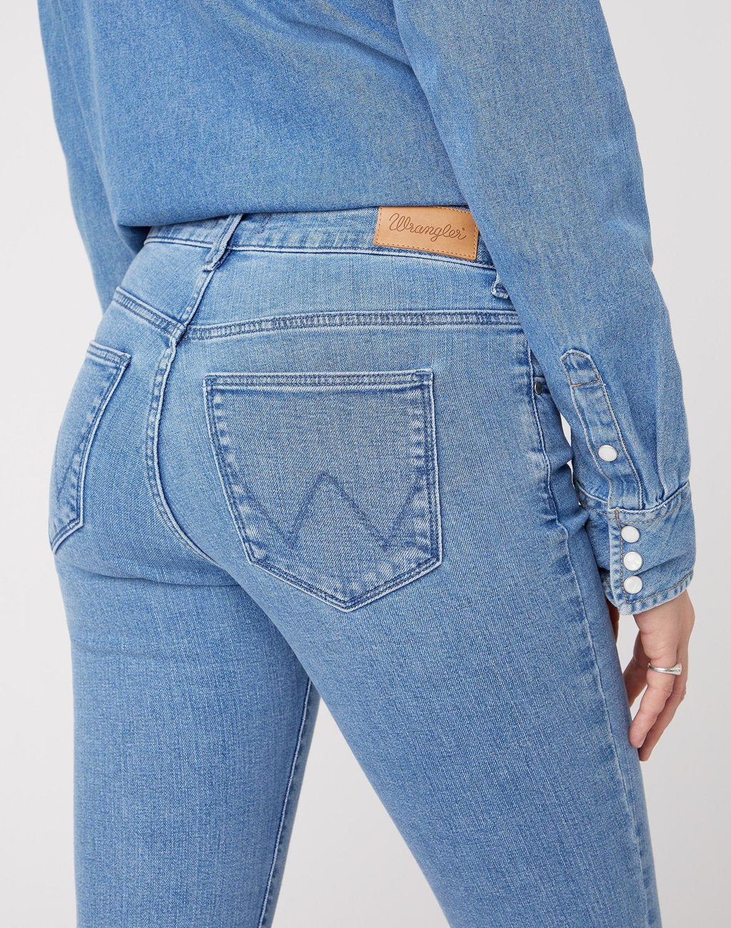 SPODNIE DAMSKIE WRANGLER SKINNY INDIGO SKY W28KKR29G 112128293