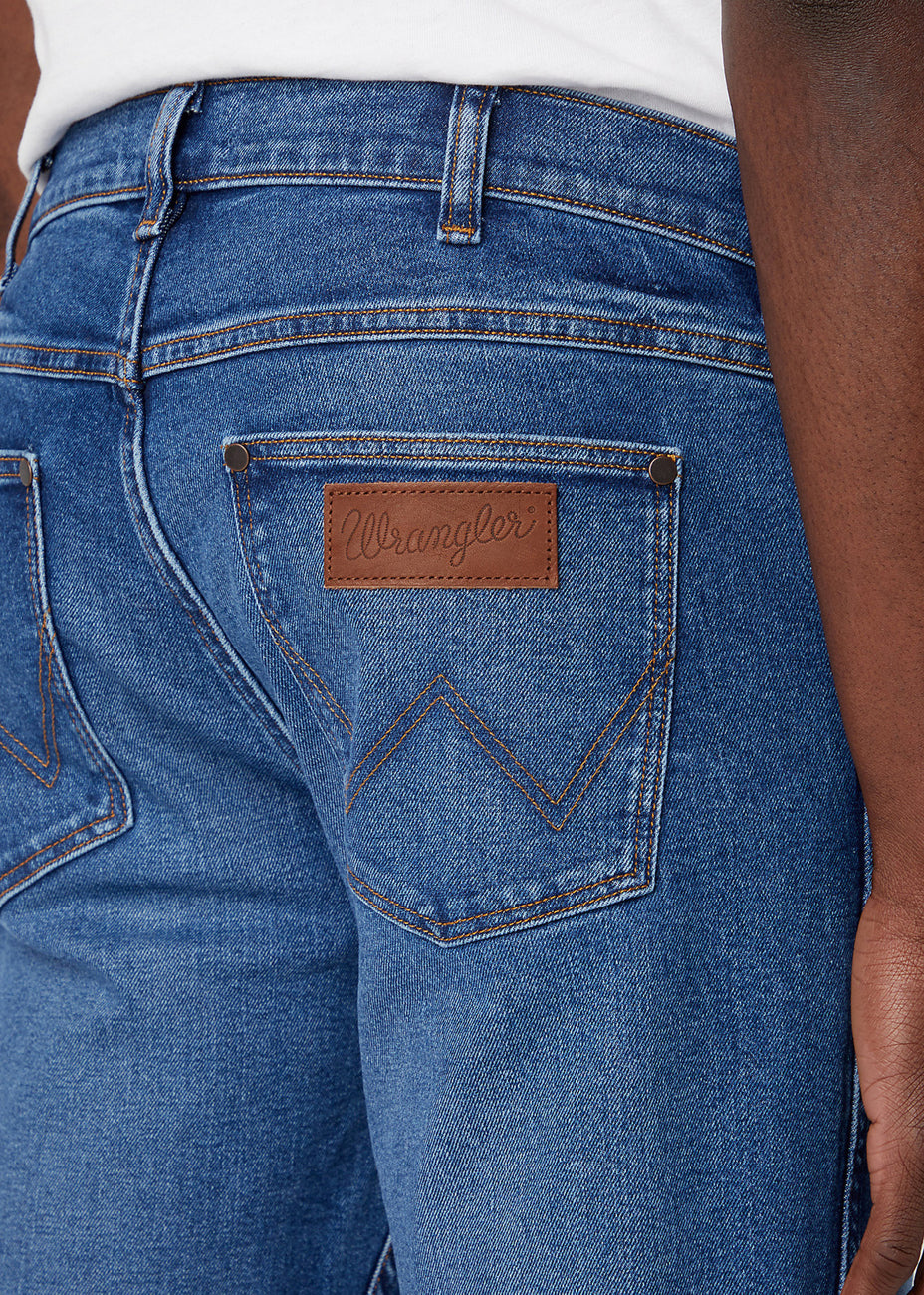 WRANGLER GREENSBORO MĘSKIE SPODNIE JEANSOWE NEPTUN W15QU8399