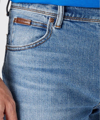 WRANGLER TEXAS MĘSKIE SPODNIE JEANSOWE GLASTON BLUE W121HN13S 112145769