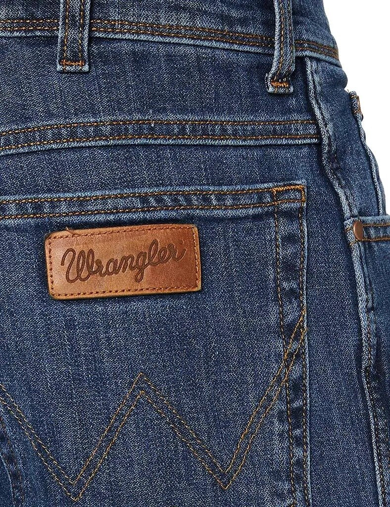 WRANGLER TEXAS SLIM MĘSKIE SPODNIE JEANSOWE JEANSY THE BOSS W12SP1131 112126511